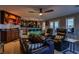 Finished basement features a wet bar, theater seating, and ample room for entertaining guests at 10280 W La Mancha Ave, Las Vegas, NV 89149