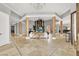 Grand foyer featuring high ceilings, elegant columns, and marble flooring at 10280 W La Mancha Ave, Las Vegas, NV 89149