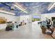 Bright garage with ample storage, work area and sky-painted ceiling at 10280 W La Mancha Ave, Las Vegas, NV 89149