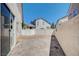 Paver and gravel backyard, surrounded by fences for privacy at 10360 Cherry Brook St, Las Vegas, NV 89183