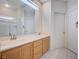 Bathroom featuring dual sinks, and large mirror at 10360 Cherry Brook St, Las Vegas, NV 89183