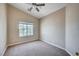 Well-lit bedroom features vaulted ceiling and a ceiling fan at 10360 Cherry Brook St, Las Vegas, NV 89183