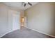 Carpeted bedroom includes a closet and leads to the hallway at 10360 Cherry Brook St, Las Vegas, NV 89183