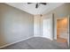 Carpeted bedroom features a closet and an entrance to the hallway at 10360 Cherry Brook St, Las Vegas, NV 89183