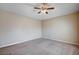 A bright bedroom features carpet and neutral walls at 10360 Cherry Brook St, Las Vegas, NV 89183