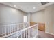 Bright second floor hallway featuring built-in cabinets at 10360 Cherry Brook St, Las Vegas, NV 89183