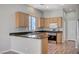 Kitchen featuring a breakfast bar with granite countertops at 10360 Cherry Brook St, Las Vegas, NV 89183
