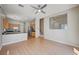 Open concept living area with hardwood floors and view of the kitchen at 10360 Cherry Brook St, Las Vegas, NV 89183