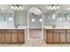 Bathroom features dual vanities and arched entryway for a seamless open feel at 10805 Cain Ave, Las Vegas, NV 89166