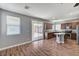 Open kitchen and dining area with stainless appliances and sliding doors to the backyard at 10805 Cain Ave, Las Vegas, NV 89166