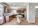 Open kitchen featuring granite counters, stainless appliances, and seamless flow to living spaces at 10805 Cain Ave, Las Vegas, NV 89166