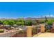 Scenic neighborhood view showcases mature trees, manicured landscaping, and mountain views at 10805 Cain Ave, Las Vegas, NV 89166