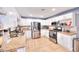 Bright kitchen features stainless steel appliances, granite countertops, and ample cabinet space at 1112 Sandy Cove St, Las Vegas, NV 89110