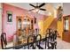 Formal dining area with an ornate table set and staircase view at 1333 Date Palm Cir, Las Vegas, NV 89108