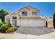 Charming two-story home with a three-car garage and well-maintained landscaping at 1333 Date Palm Cir, Las Vegas, NV 89108