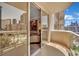 Inviting balcony offering views of a pool, city skyline, and relaxing outdoor space at 135 E Harmon Ave # 315, Las Vegas, NV 89109