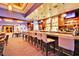 Upscale bar area featuring ample seating, stylish lighting, and a fully stocked bar for entertainment at 135 E Harmon Ave # 315, Las Vegas, NV 89109