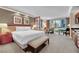 Comfortable suite featuring a king-size bed, city views, and a kitchenette at 135 E Harmon Ave # 315, Las Vegas, NV 89109