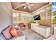 Relaxing cabana with comfortable seating, a TV, and a mini-fridge for outdoor enjoyment at 135 E Harmon Ave # 315, Las Vegas, NV 89109