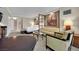 Spacious living area featuring a king bed, a sitting area, and city views at 135 E Harmon Ave # 315, Las Vegas, NV 89109