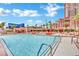 A large, inviting pool with lounge chairs and umbrellas, perfect for relaxation at 135 E Harmon Ave # 315, Las Vegas, NV 89109