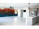 Expansive open-concept layout seamlessly blends living and kitchen areas with modern fixtures and appliances at 1703 Game Garden Rd, North Las Vegas, NV 89031