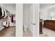 En suite bathroom and walk in closet off of main bedroom at 209 Prairie Creek St, Henderson, NV 89012