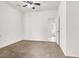 Neutral bedroom with carpet, a ceiling fan, and an en-suite bathroom at 209 Prairie Creek St, Henderson, NV 89012
