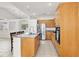 Spacious kitchen featuring an island, stainless steel appliances, and wooden cabinets at 209 Prairie Creek St, Henderson, NV 89012