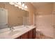 Bathroom features a double sink vanity and a shower-tub combo at 2189 De Narvik Dr, Henderson, NV 89044