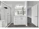 Bright bathroom featuring a walk-in shower, oversized vanity, and recessed lighting at 2231 Desert Prairie St, Las Vegas, NV 89135