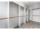 Walk-in closet with multiple shelves and rods at 2231 Desert Prairie St, Las Vegas, NV 89135