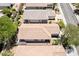 An aerial view of the tile roof and landscaping of a single-story home in a suburban neighborhood at 2326 Garnet Star St, Henderson, NV 89044