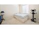 Spare bedroom featuring a twin bed, neutral walls, a window, and an exercise machine at 2326 Garnet Star St, Henderson, NV 89044