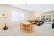 Bright dining area adjacent to the living room with ample seating at 2326 Garnet Star St, Henderson, NV 89044