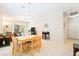 Open concept living and dining area with natural light and comfortable seating at 2326 Garnet Star St, Henderson, NV 89044