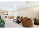 Spacious living room with comfortable seating and a view of the dining area at 2326 Garnet Star St, Henderson, NV 89044