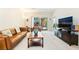 Cozy living room with sliding doors to the patio and comfortable seating at 2326 Garnet Star St, Henderson, NV 89044
