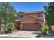 Charming two-story home showcasing a well-maintained front yard and inviting curb appeal at 2373 Rue Royale St, Henderson, NV 89044