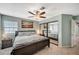 Serene bedroom featuring a large bed, mirrored closet, and soft lighting, ideal for relaxation at 2412 Muirfield Ave, Henderson, NV 89074