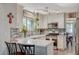 Bright and updated kitchen with stainless appliances and stylish backsplash at 2412 Muirfield Ave, Henderson, NV 89074