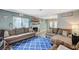 Cozy living room with fireplace and comfortable couches, great for relaxing at 2412 Muirfield Ave, Henderson, NV 89074