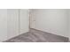 Neutral carpet and closet space highlight this bedroom's features, creating a comfortable area at 2432 Spanish Ct, Las Vegas, NV 89108