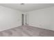 Spacious bedroom featuring neutral paint, carpet, and ample closet space at 2432 Spanish Ct, Las Vegas, NV 89108