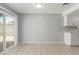 Open dining room with tile flooring and sliding glass door at 2432 Spanish Ct, Las Vegas, NV 89108