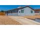 Inviting single-Gathering home with a long driveway and a neat front yard, perfect for suburban living at 2432 Spanish Ct, Las Vegas, NV 89108