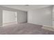 Bright living room with neutral color palette and tiled walkway at 2432 Spanish Ct, Las Vegas, NV 89108