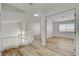 Second-floor landing with hardwood floors, staircase, and an open floorplan at 2573 Rafferty Creek Ln, Las Vegas, NV 89156
