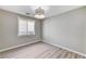 Bedroom featuring a large window, neutral paint, and modern floors at 2714 Langlade Ave, Henderson, NV 89052
