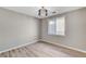 Bedroom featuring a large window, neutral paint, and modern floors at 2714 Langlade Ave, Henderson, NV 89052